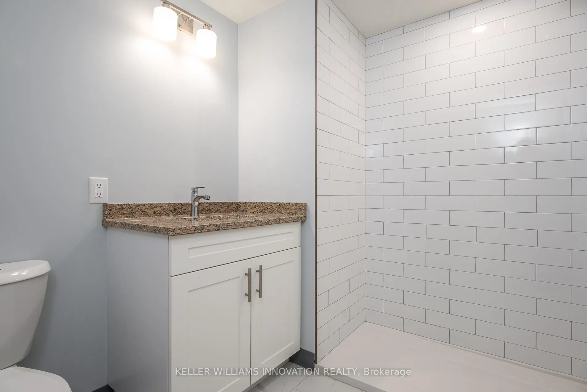 Photo 10 of Unit 002, 10 Queen Street, St. Thomas — HOMEH