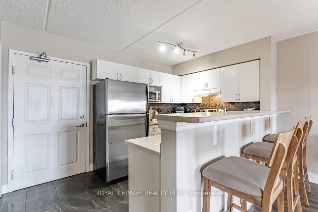 Photo 1 of Unit 309, 1370 Main Street E, Milton, Dempsey — HOMEH
