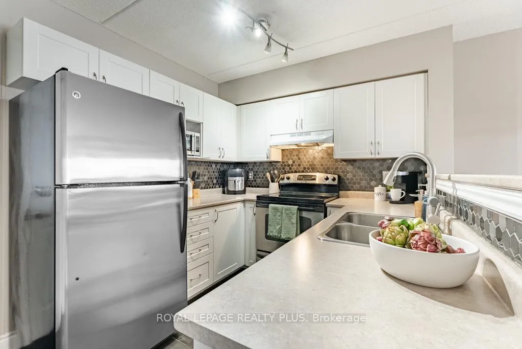 Photo 3 of Unit 309, 1370 Main Street E, Milton, Dempsey — HOMEH