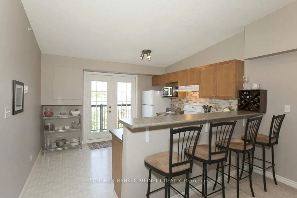 Photo 5 of Unit 407, 2065 Appleby Line, Burlington, Uptown — HOMEH