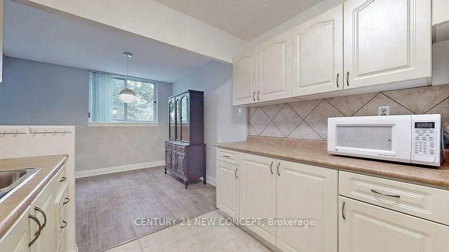 Photo 22 of Unit 101, 7451 Yonge Street, Markham, Thornhill — HOMEH
