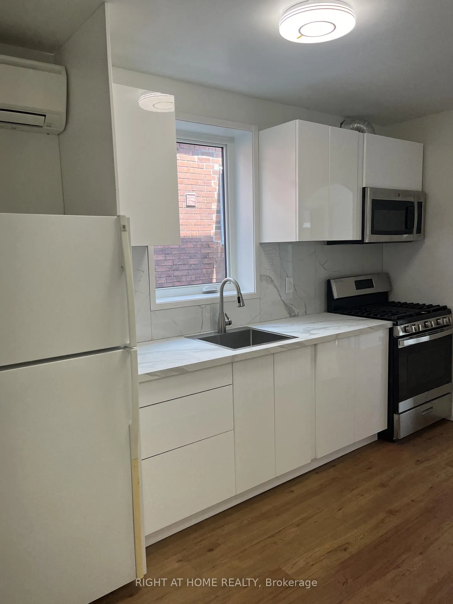 Photo 5 of Unit Main fl, 55 Beresford Avenue, Toronto, High Park-Swansea — HOMEH