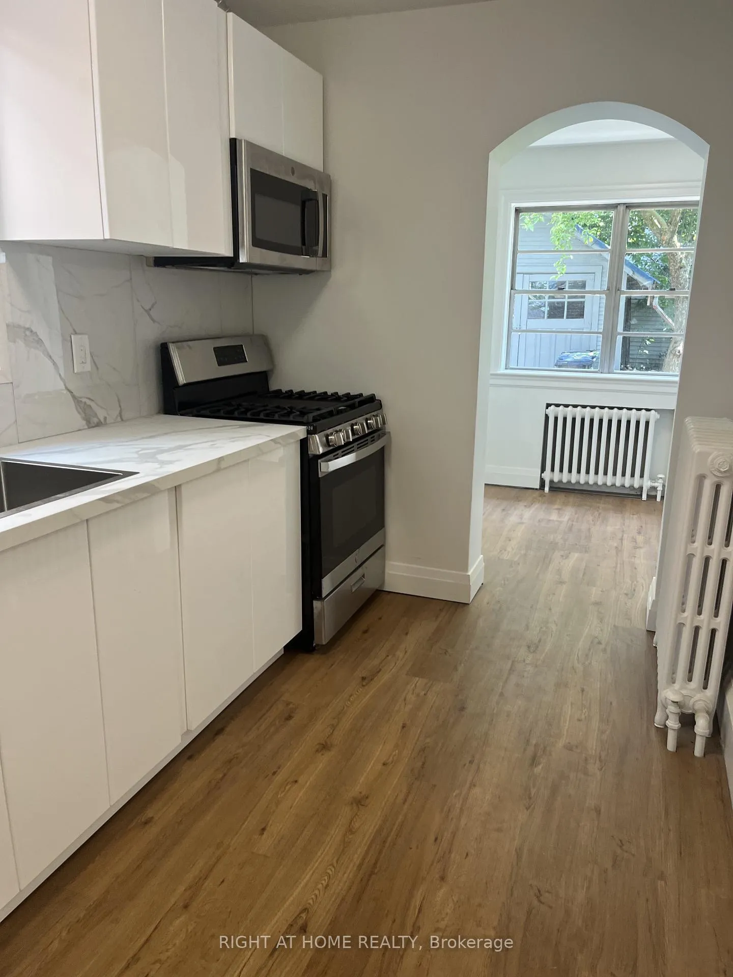 Photo 6 of Unit Main fl, 55 Beresford Avenue, Toronto, High Park-Swansea — HOMEH
