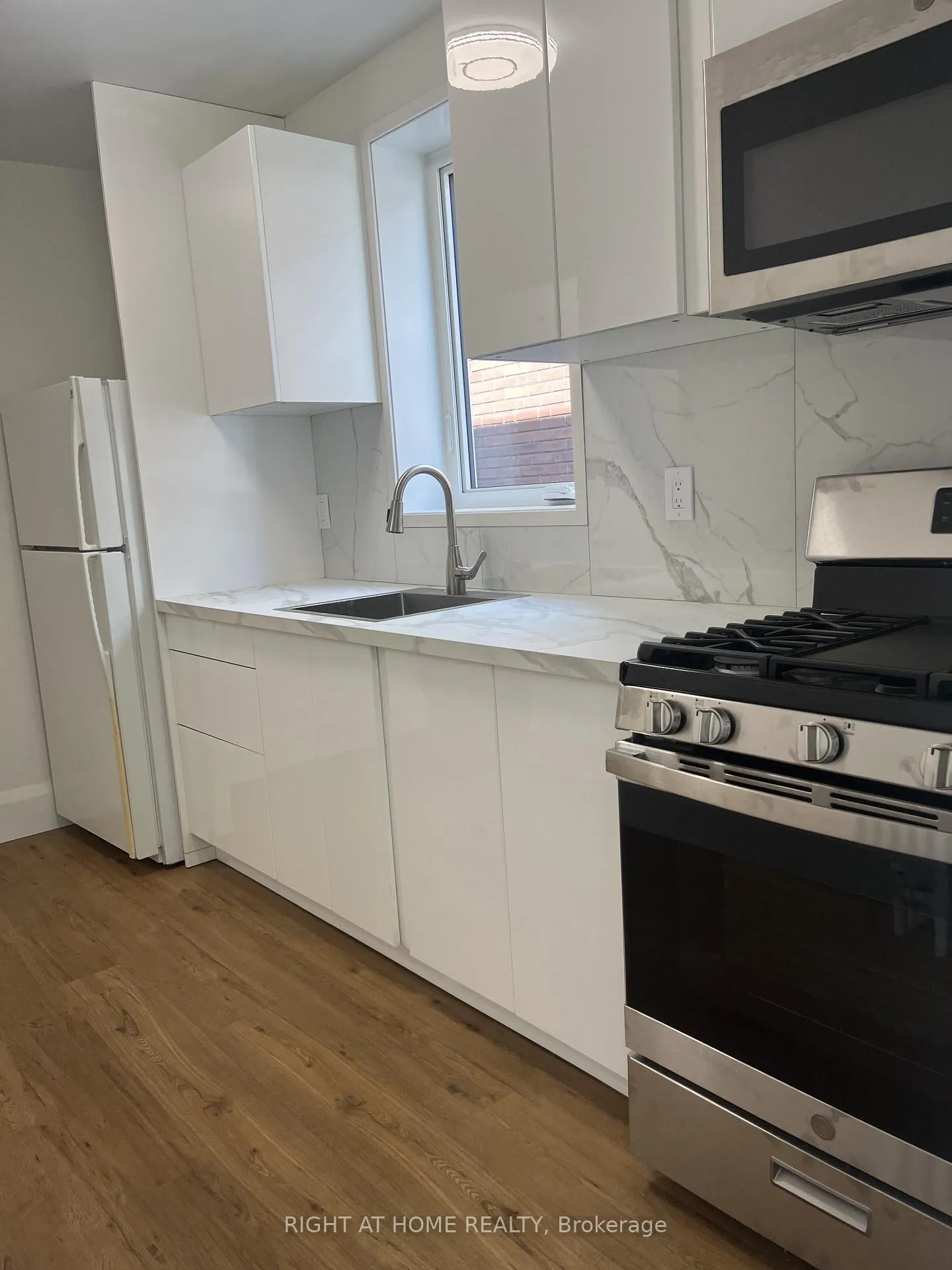Photo 7 of Unit Main fl, 55 Beresford Avenue, Toronto, High Park-Swansea — HOMEH