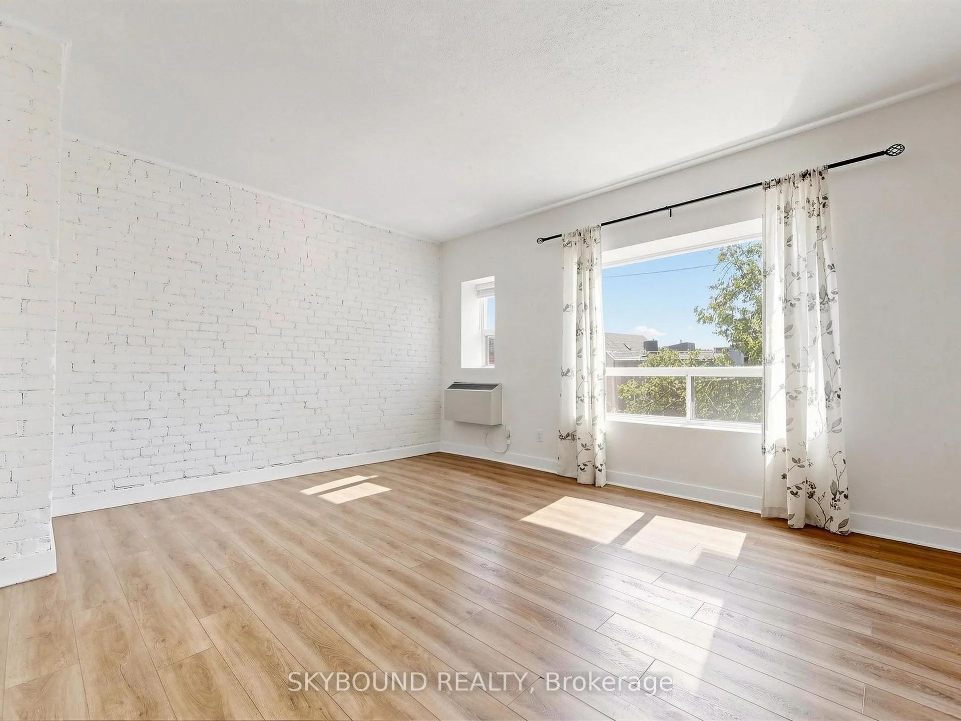 Front of Unit F, 133 Wineva Avenue