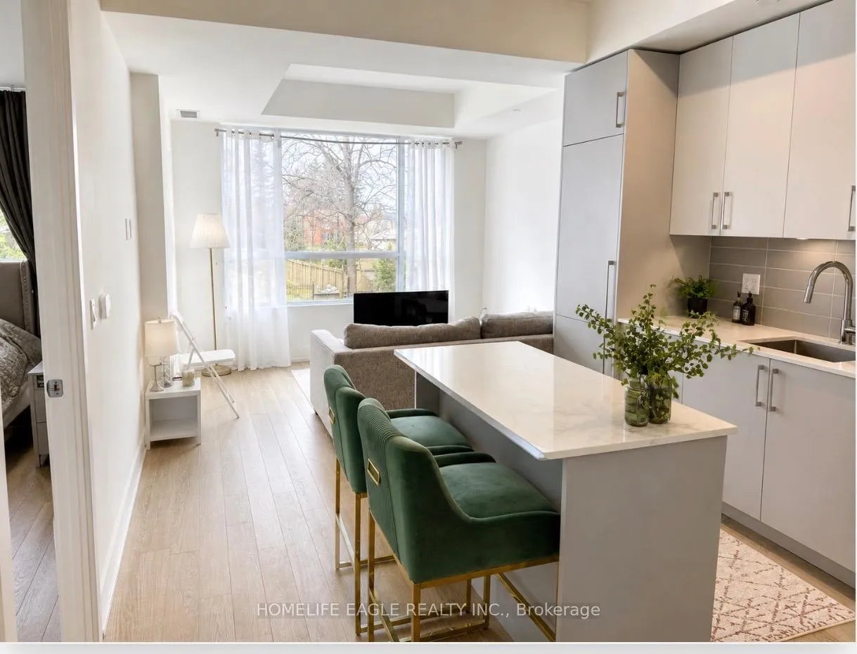 Photo 2 of Unit 220, 2075 King Road, King, King City — HOMEH