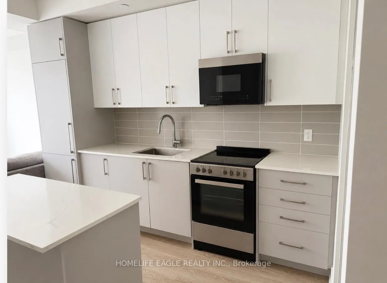 Photo 4 of Unit 220, 2075 King Road, King, King City — HOMEH