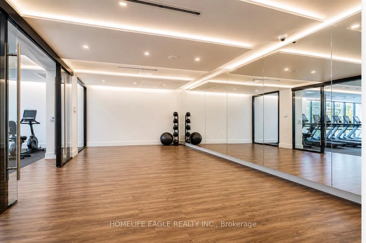 Photo 10 of Unit 220, 2075 King Road, King, King City — HOMEH