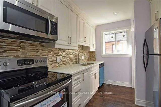 Photo 7 of Unit Upper L, 83 Mcmurchy Avenue, Brampton, Brampton South — HOMEH