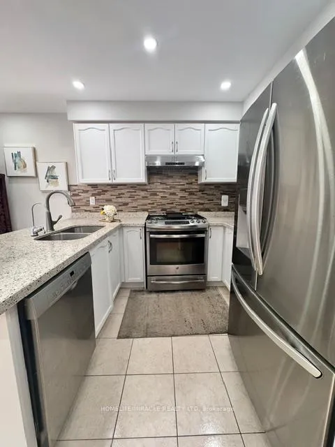Photo 4 of 65 Bellchase Trail, Brampton, Bram East — HOMEH