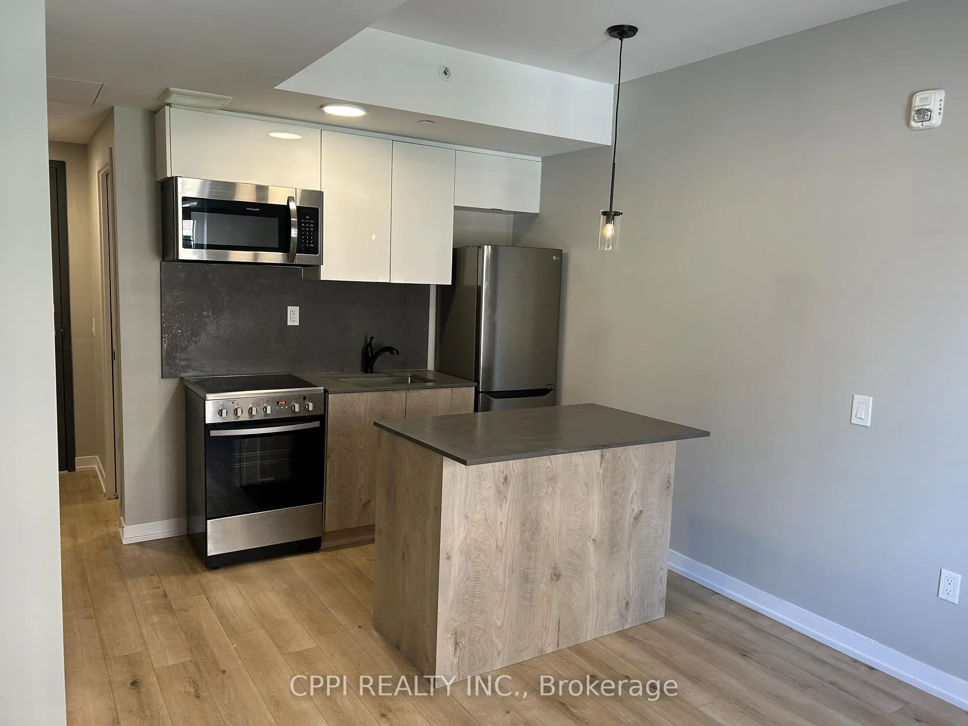 Photo 5 of Unit 313, 70 King Street E, Oshawa, Central — HOMEH