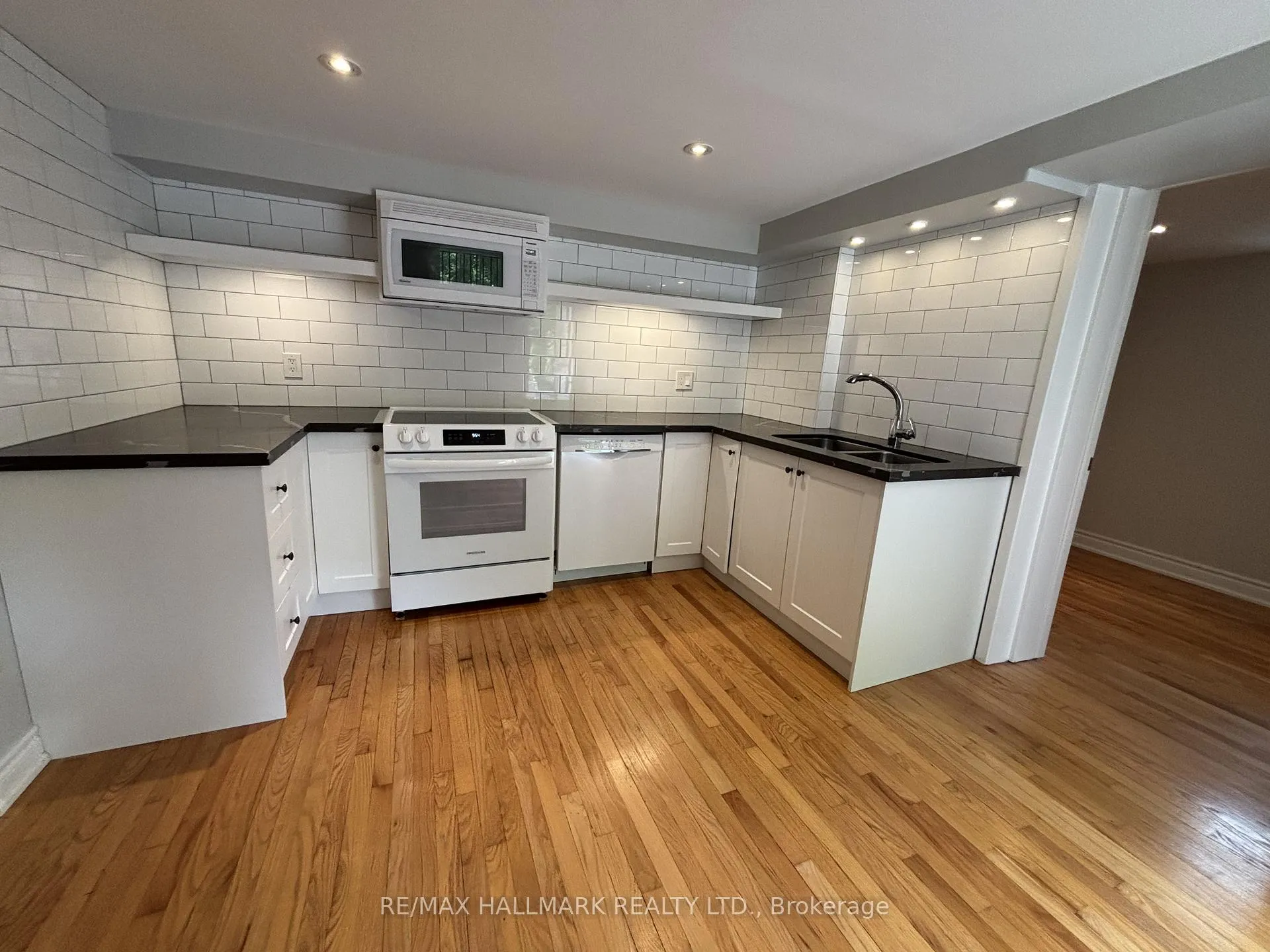 Photo 2 of Unit A, 306A Clendenan Avenue, Toronto, High Park North — HOMEH