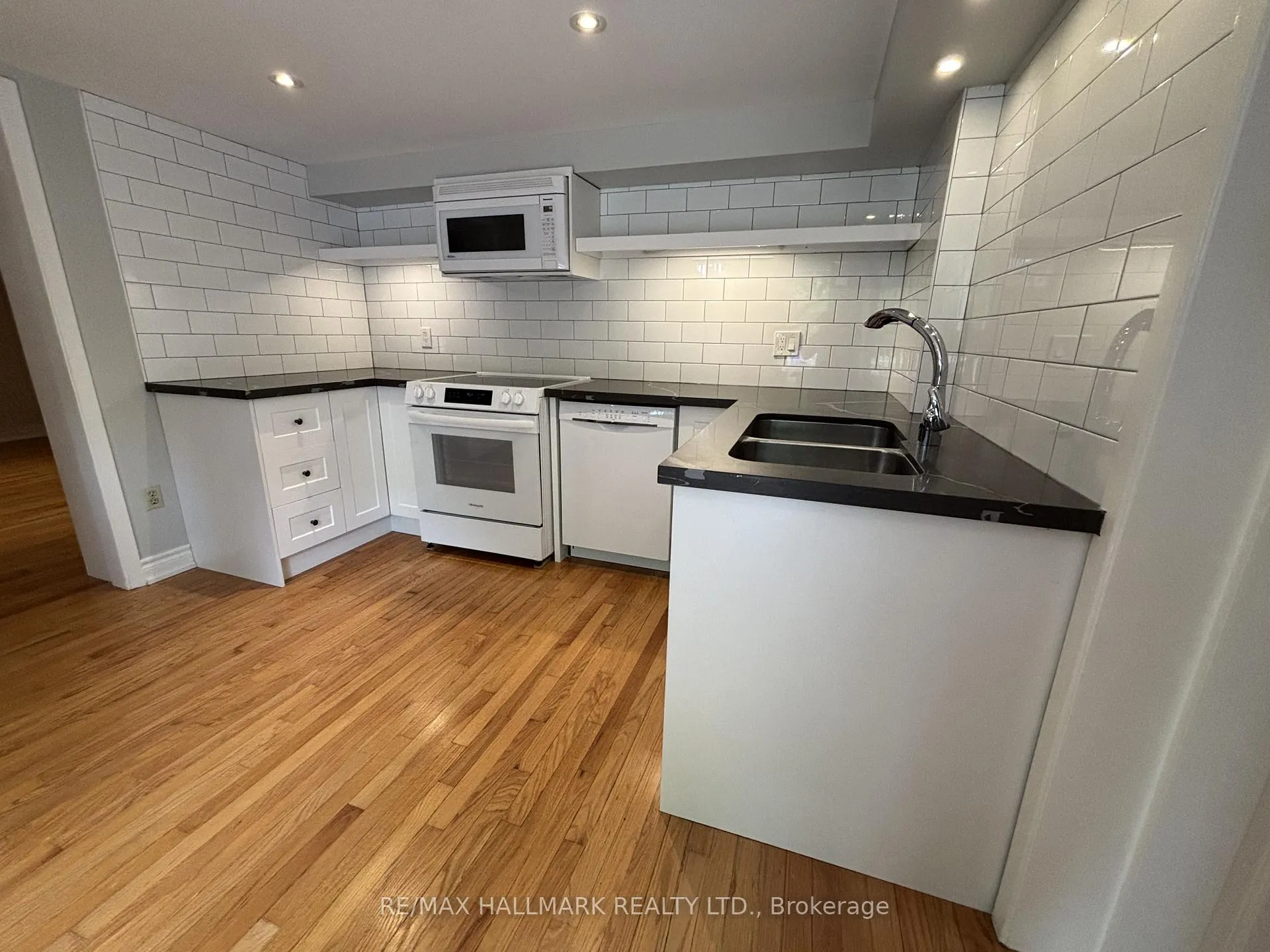 Photo 3 of Unit A, 306A Clendenan Avenue, Toronto, High Park North — HOMEH