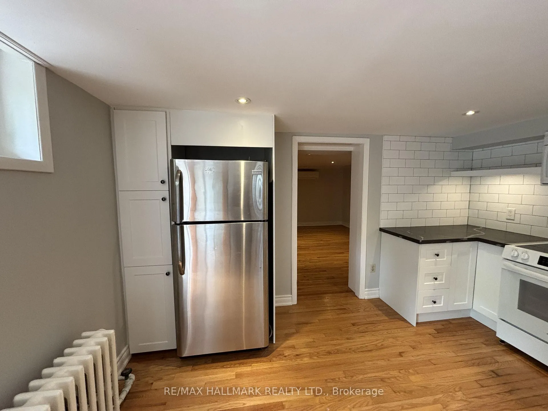 Photo 4 of Unit A, 306A Clendenan Avenue, Toronto, High Park North — HOMEH