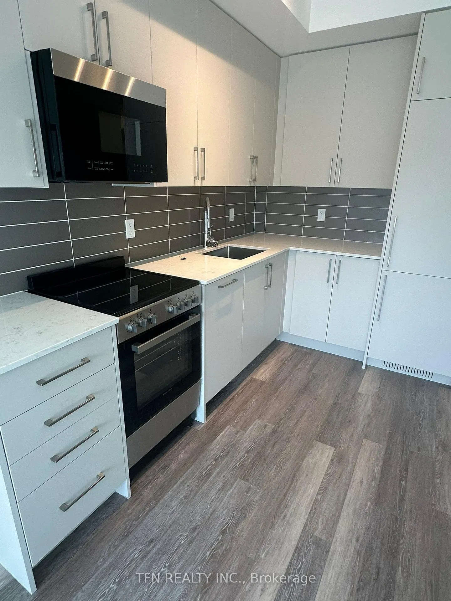Photo 2 of Unit 202, 2075 King Road, King, King City — HOMEH