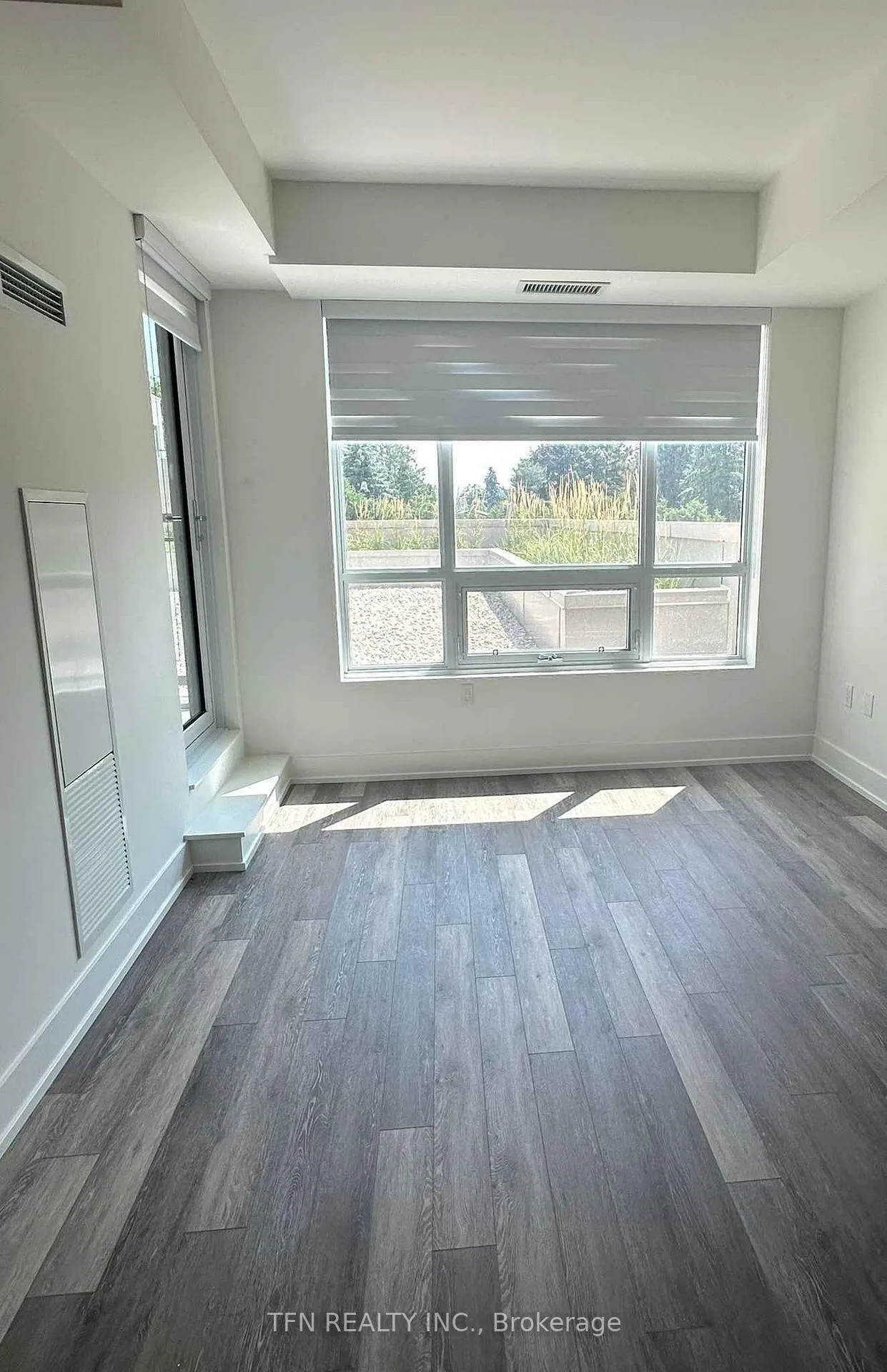Photo 3 of Unit 202, 2075 King Road, King, King City — HOMEH