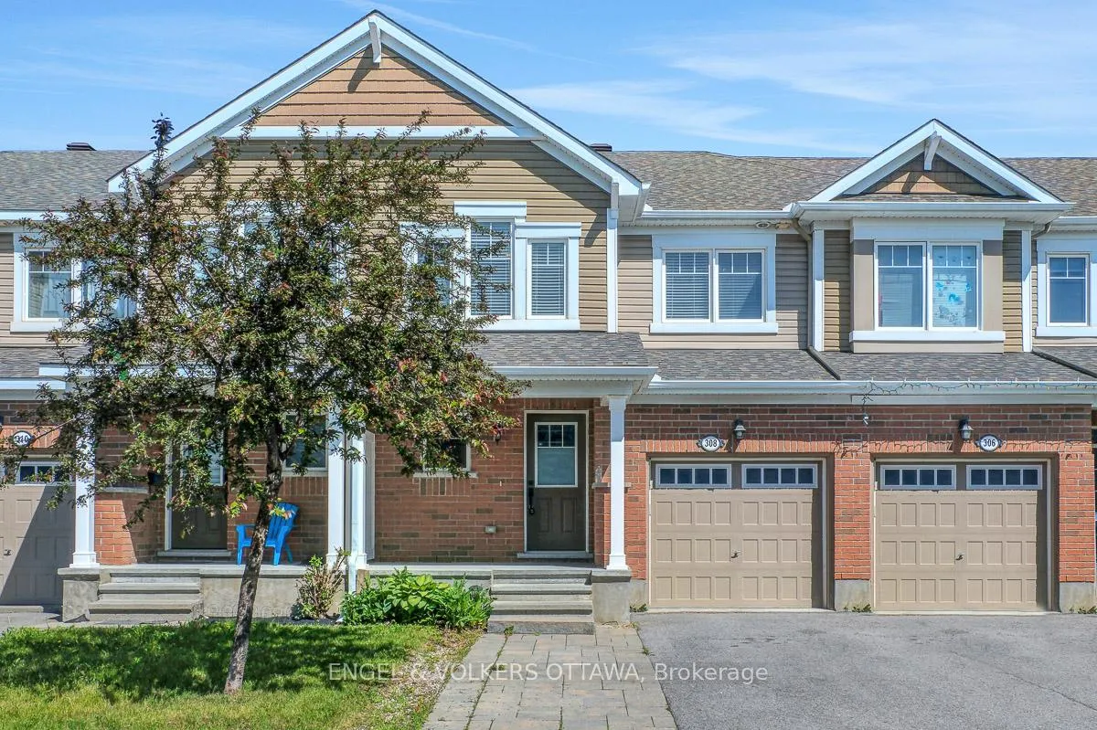 Front of 308 Song Sparrow Street W
