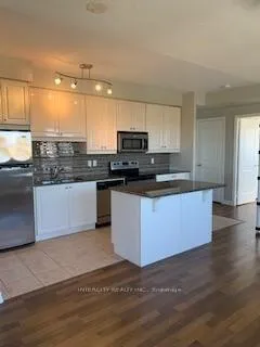 Photo 3 of Unit 404, 9225 Jane Street, Vaughan, Maple — HOMEH