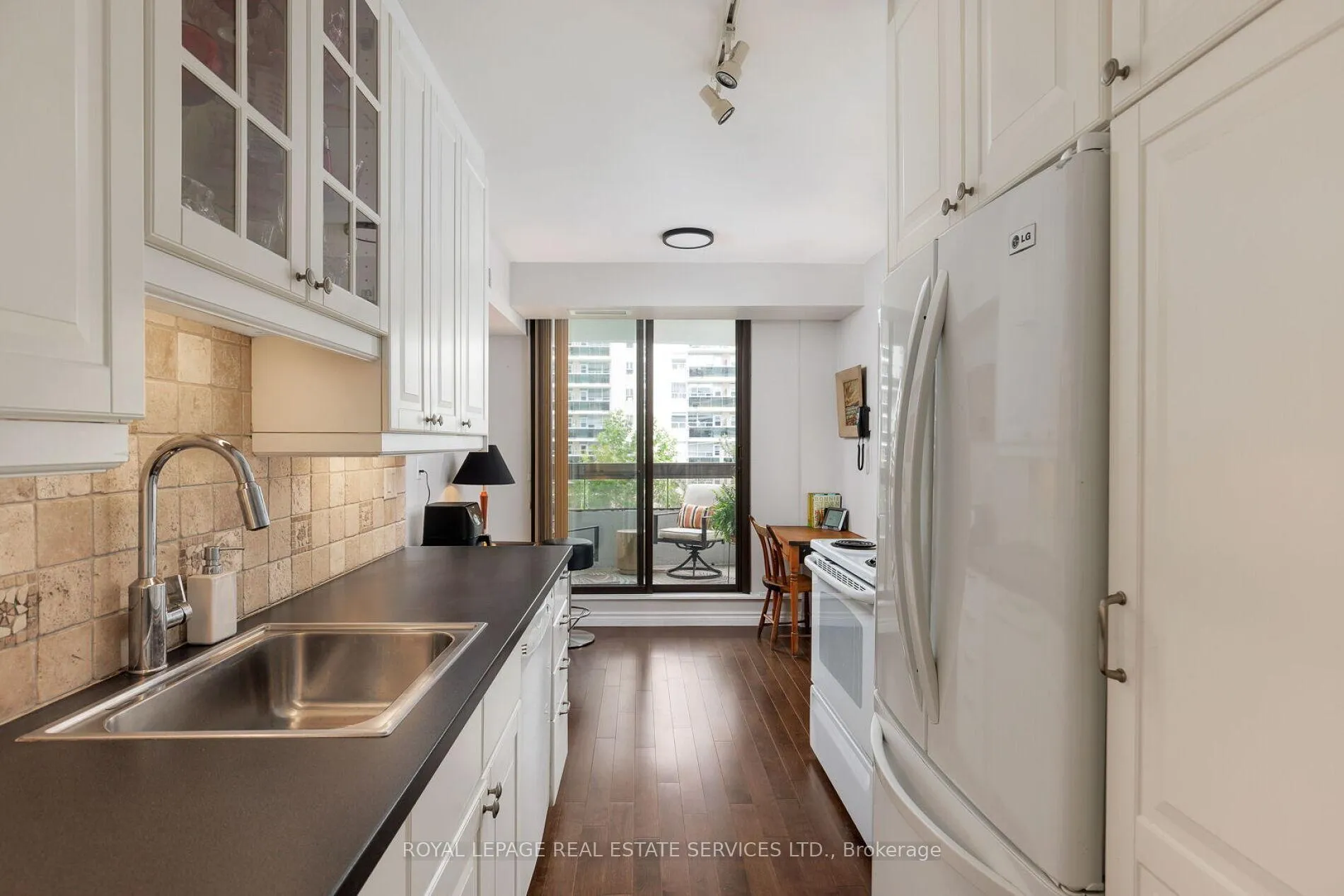 Photo 11 of Unit 401, 100 Quebec Avenue, Toronto, High Park North — HOMEH