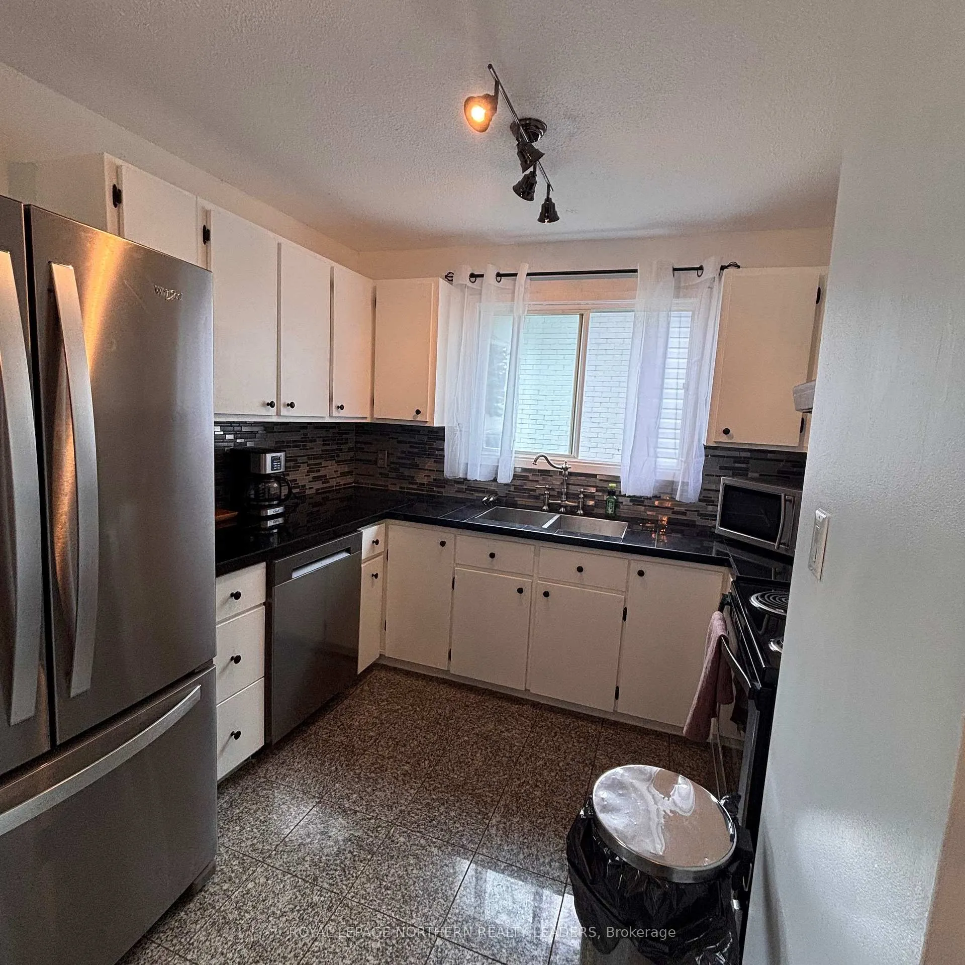 Photo 19 of 291 16th Avenue, Cochrane — HOMEH