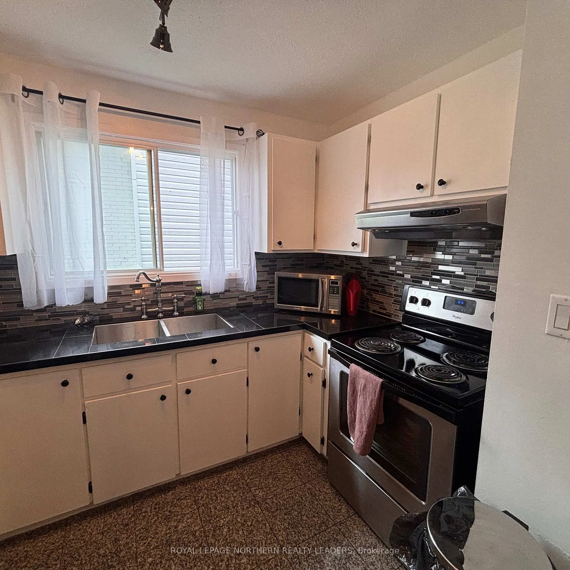 Photo 20 of 291 16th Avenue, Cochrane — HOMEH