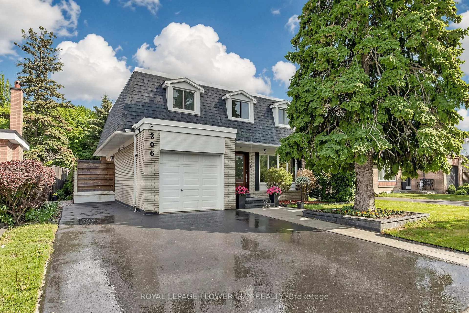Front of 206 Mcmurchy Avenue S