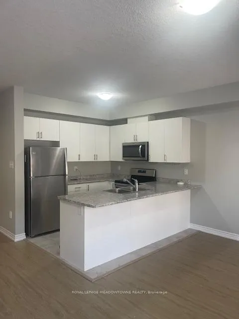 Photo 1 of Unit 29, 88 Decorso Drive, Guelph, Kortright East — HOMEH