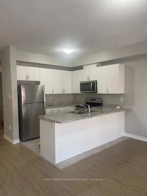 Photo 2 of Unit 29, 88 Decorso Drive, Guelph, Kortright East — HOMEH