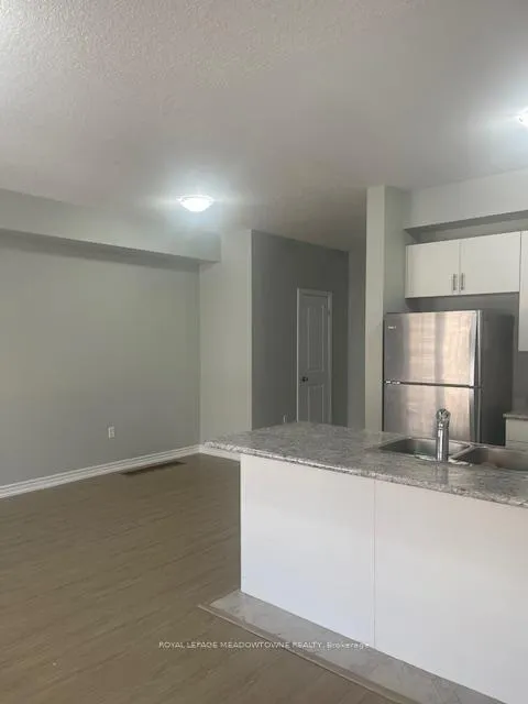 Photo 6 of Unit 29, 88 Decorso Drive, Guelph, Kortright East — HOMEH