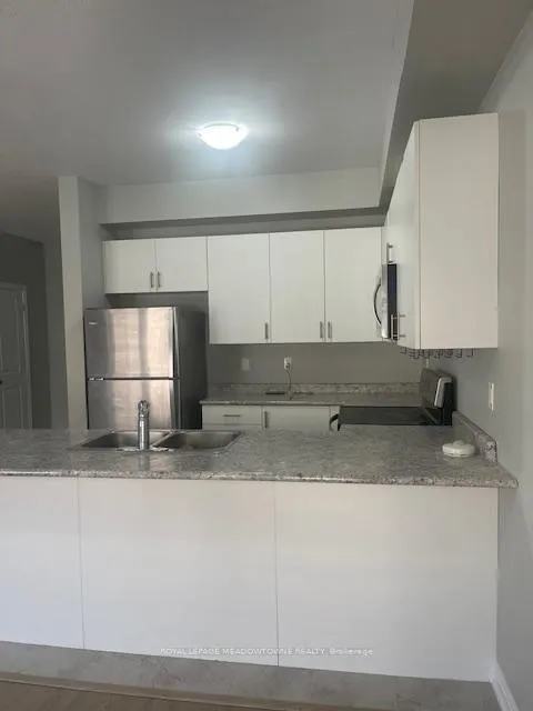 Photo 7 of Unit 29, 88 Decorso Drive, Guelph, Kortright East — HOMEH