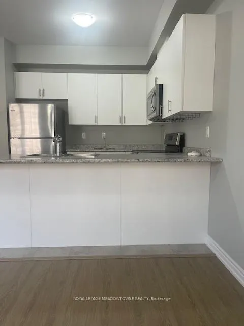 Photo 8 of Unit 29, 88 Decorso Drive, Guelph, Kortright East — HOMEH