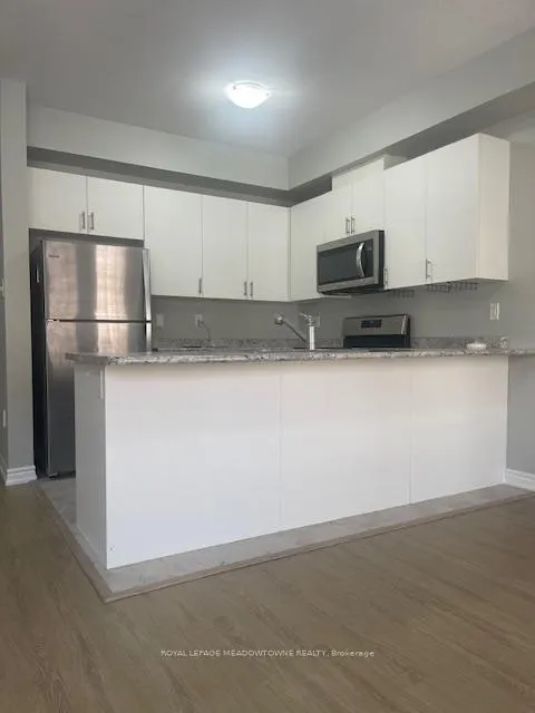 Photo 12 of Unit 29, 88 Decorso Drive, Guelph, Kortright East — HOMEH