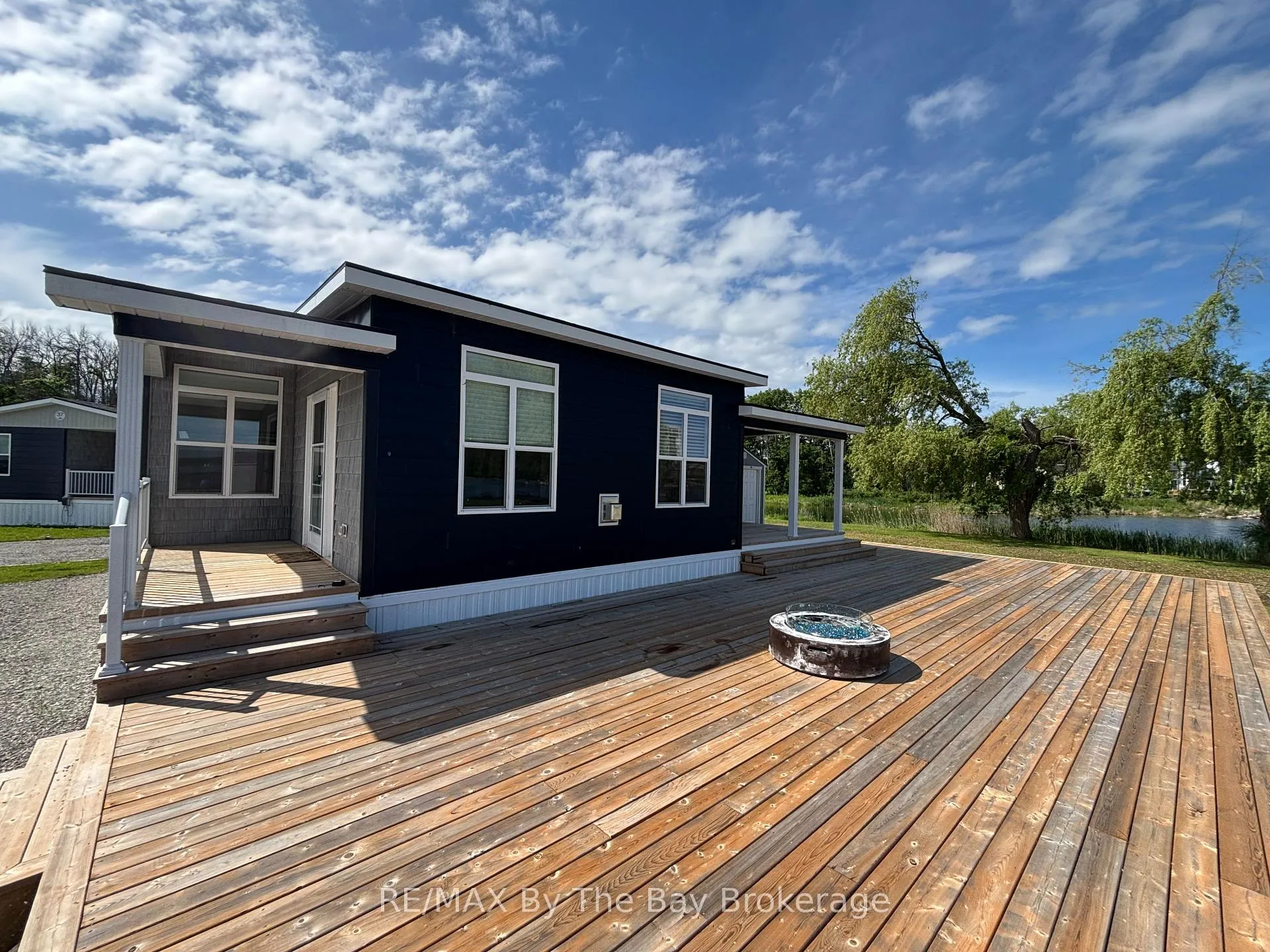 Photo 1 of Unit 38, 3282 Ogden's Beach Road, Tay, Rural Tay — HOMEH