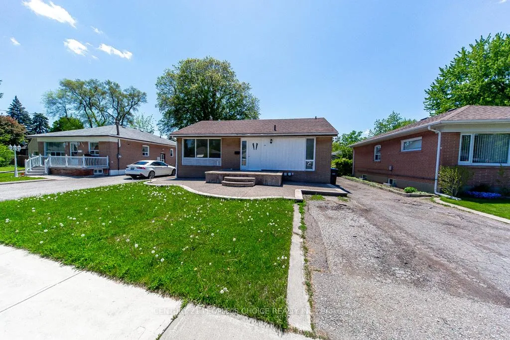 Front of 115 Mcmurchy Avenue S