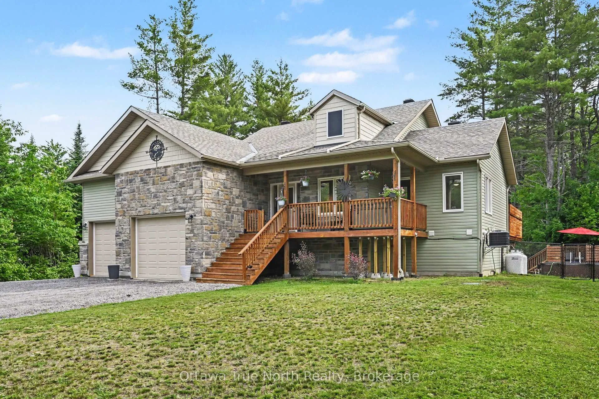 Front of 1196 Flat Rapids Road