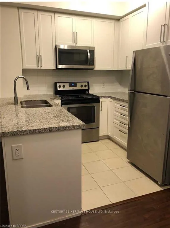 Photo 4 of Unit 5, 840 Queens Plate Drive, Etobicoke, West Humber-Clairville — HOMEH