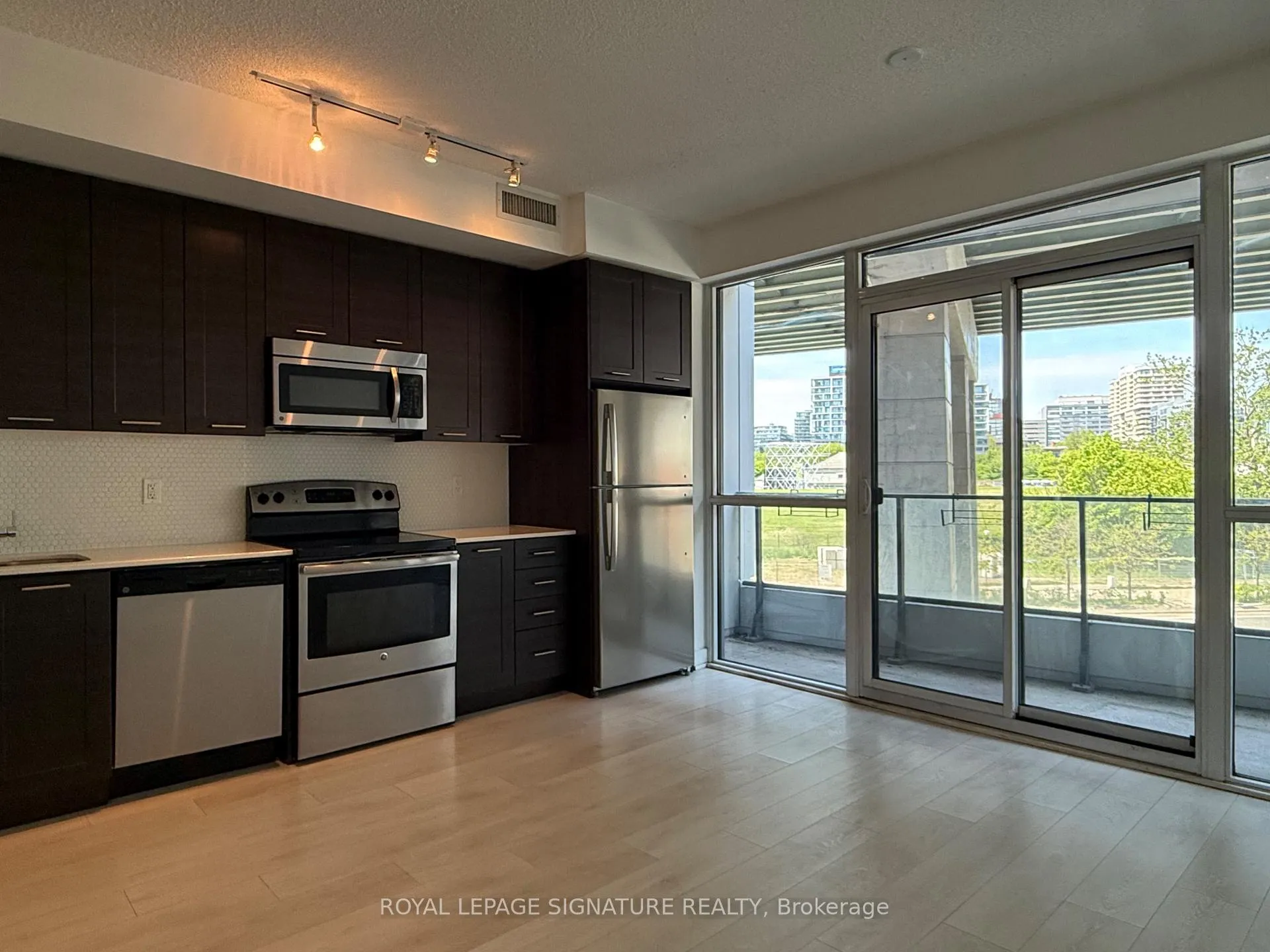 Photo 3 of Unit 305, 50 Bruyeres Mews, Toronto, Niagara — HOMEH