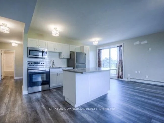 Photo 5 of Unit 405, 30 Chatham Street, Brantford, Downtown Core — HOMEH