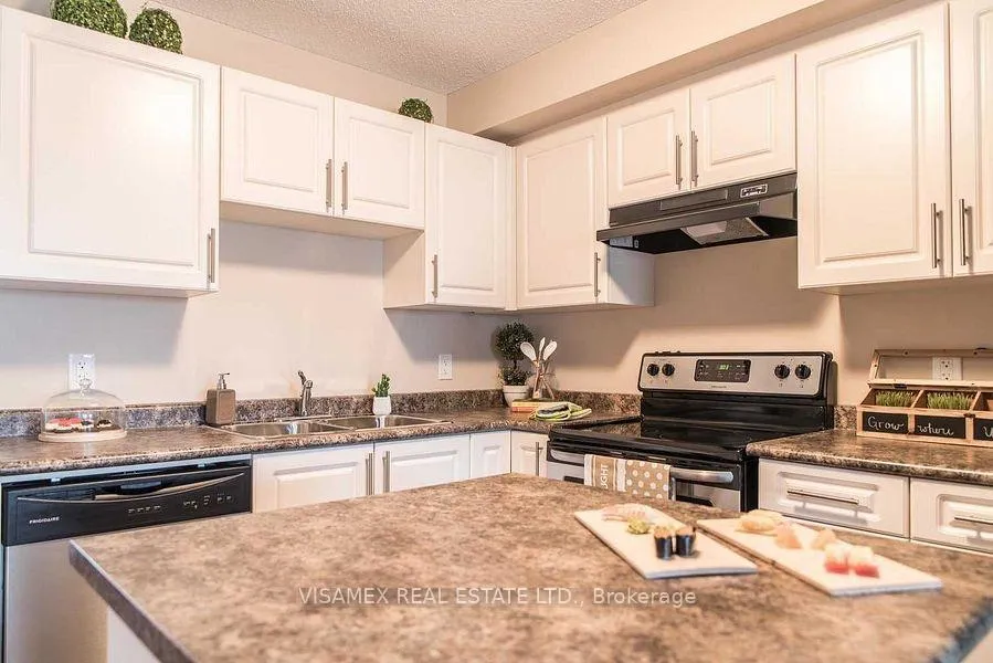 Photo 7 of Unit 11, 7768 Ascot Circle, Niagara Falls, Ascot — HOMEH