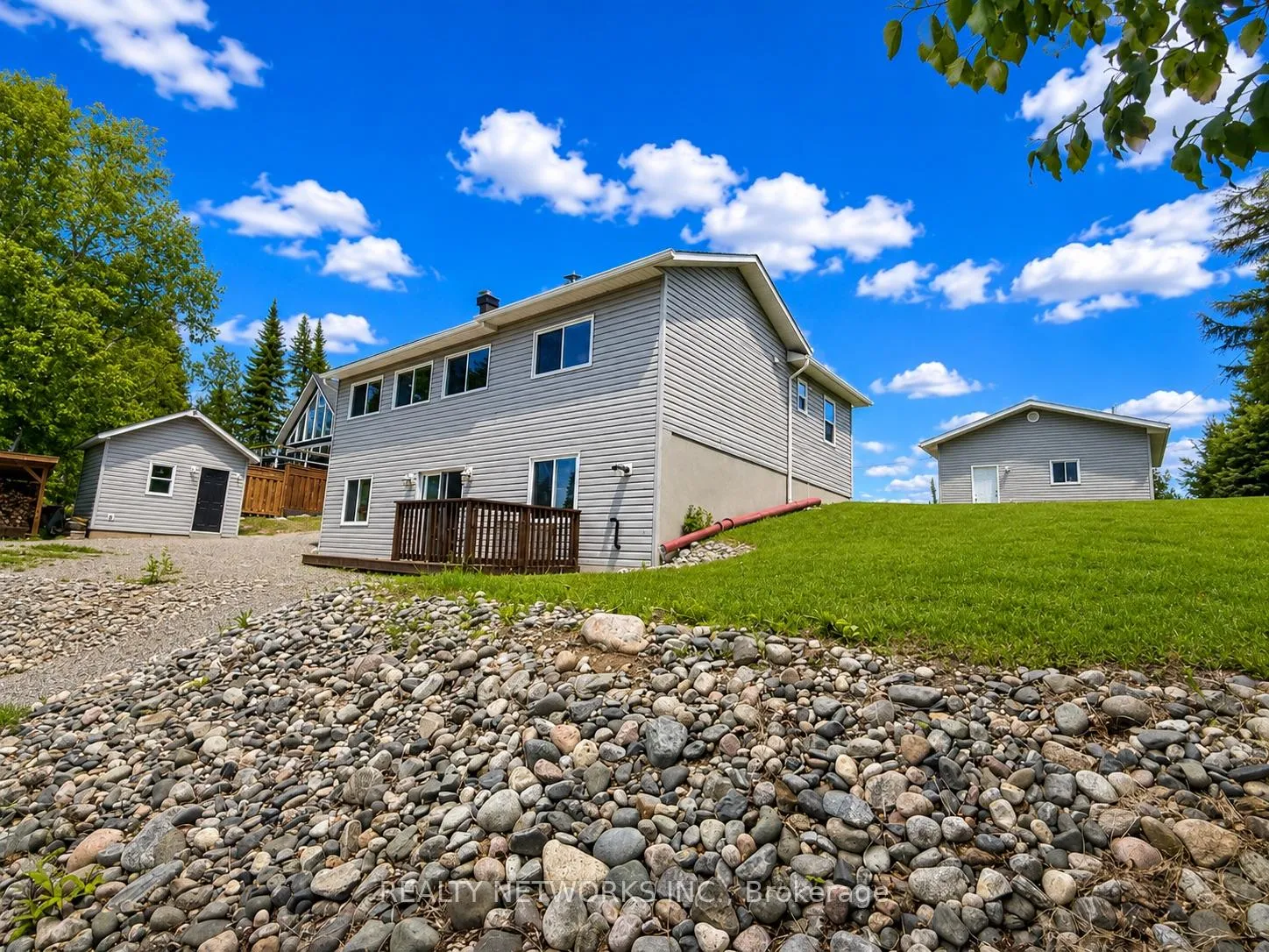 Photo 3 of 138 Anderson Drive, Timmins, TM - Outside East — HOMEH