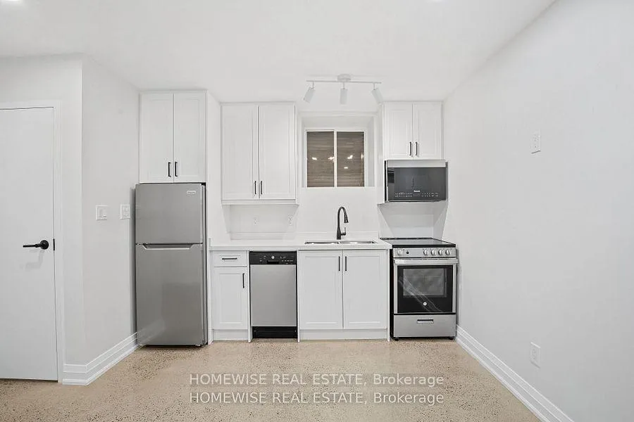 Photo 2 of Unit 5, 2563 Dundas Street W, Toronto, High Park North — HOMEH