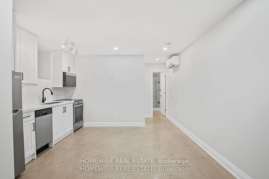 Photo 3 of Unit 5, 2563 Dundas Street W, Toronto, High Park North — HOMEH