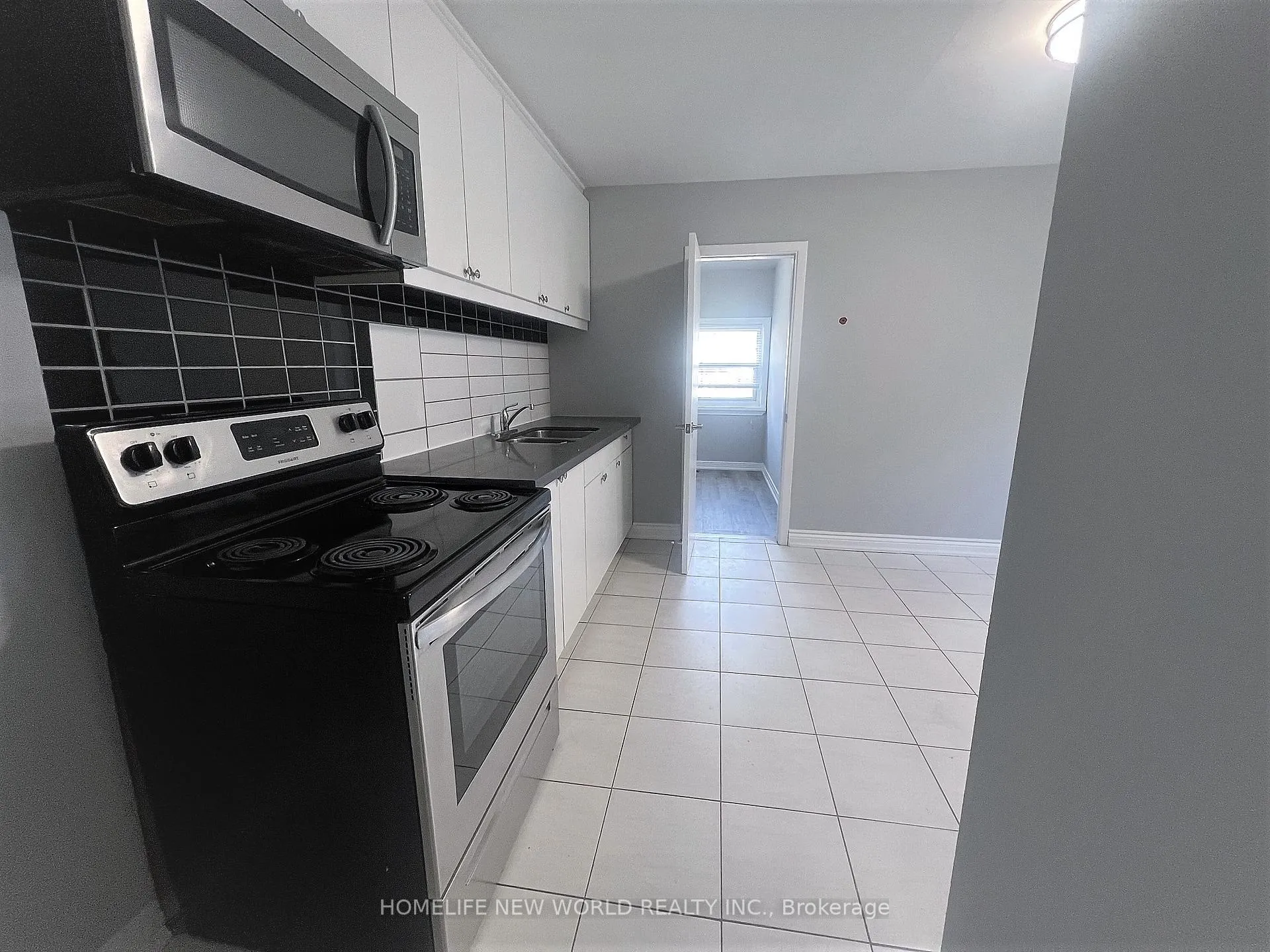 Photo 2 of Unit 1, 2 Thornton Avenue, Toronto, Caledonia-Fairbank — HOMEH