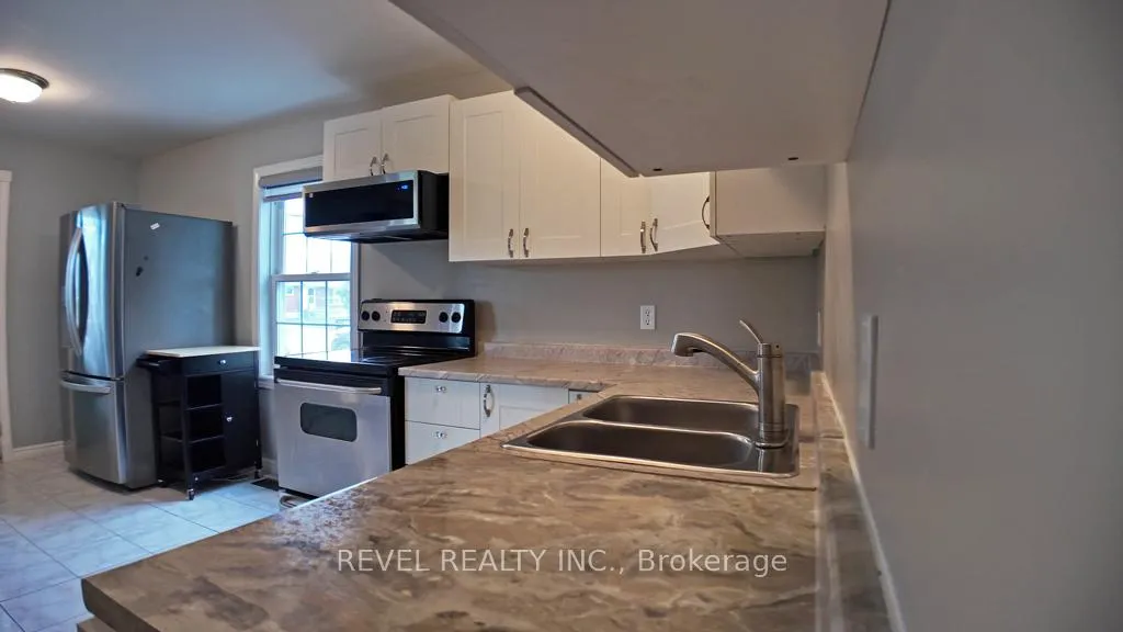 Photo 6 of 385 Cedar Street N, Timmins, TNE - Central — HOMEH