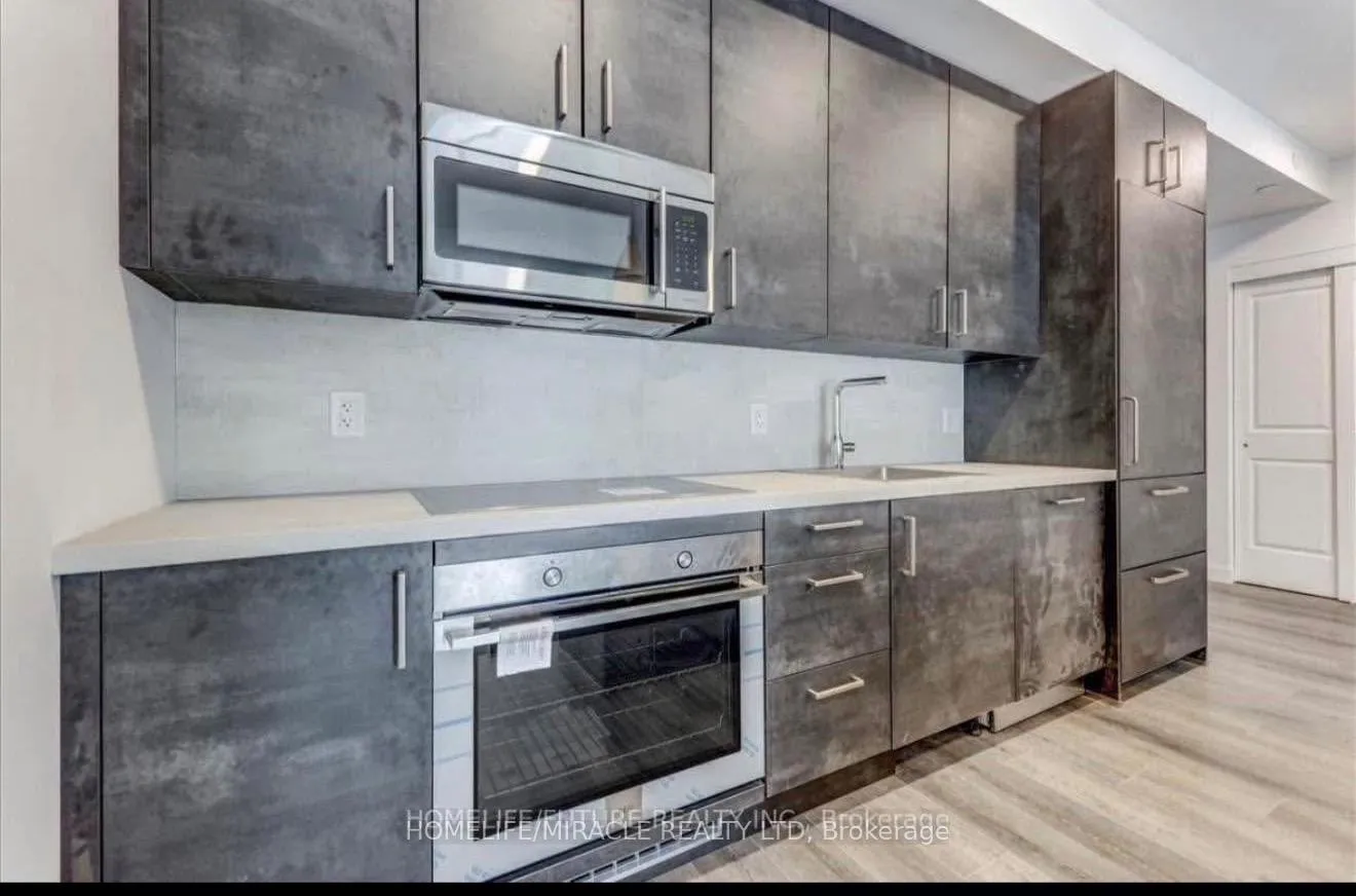 Photo 4 of Unit 116, 7549 Kalar Road, Niagara Falls, Brown — HOMEH