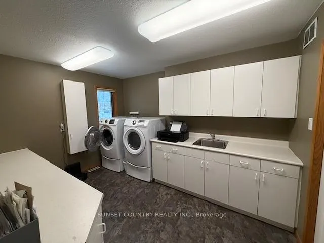 Photo 18 of 92 Edgewater Drive, Dryden, Edgewater Terrace — HOMEH
