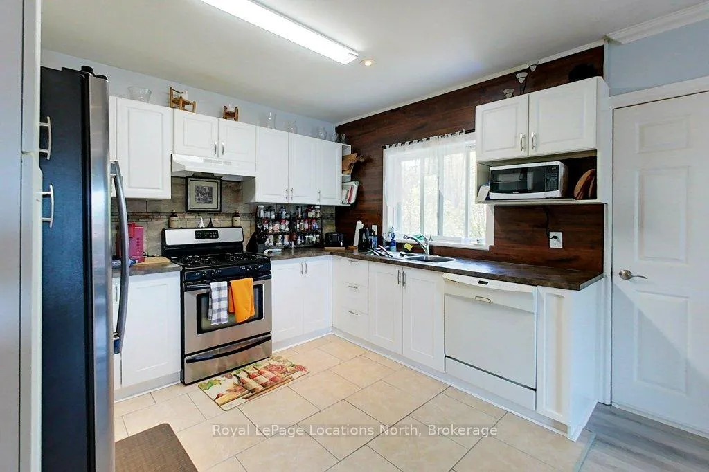 Photo 19 of 32 River Road E, Wasaga Beach — HOMEH