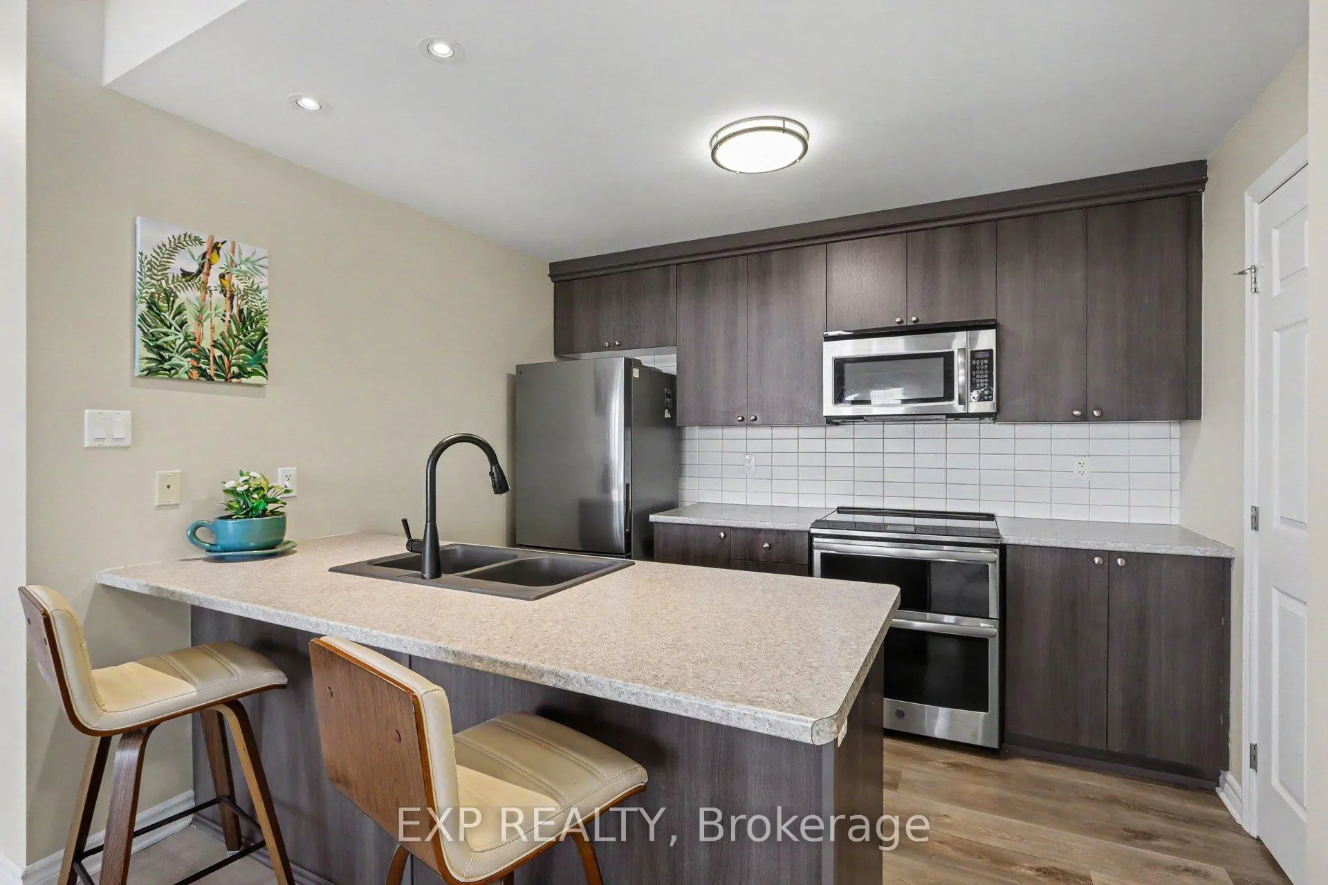 Photo 10 of Unit J, 135 Harthill Way, Ottawa, Barrhaven - Heritage Park — HOMEH