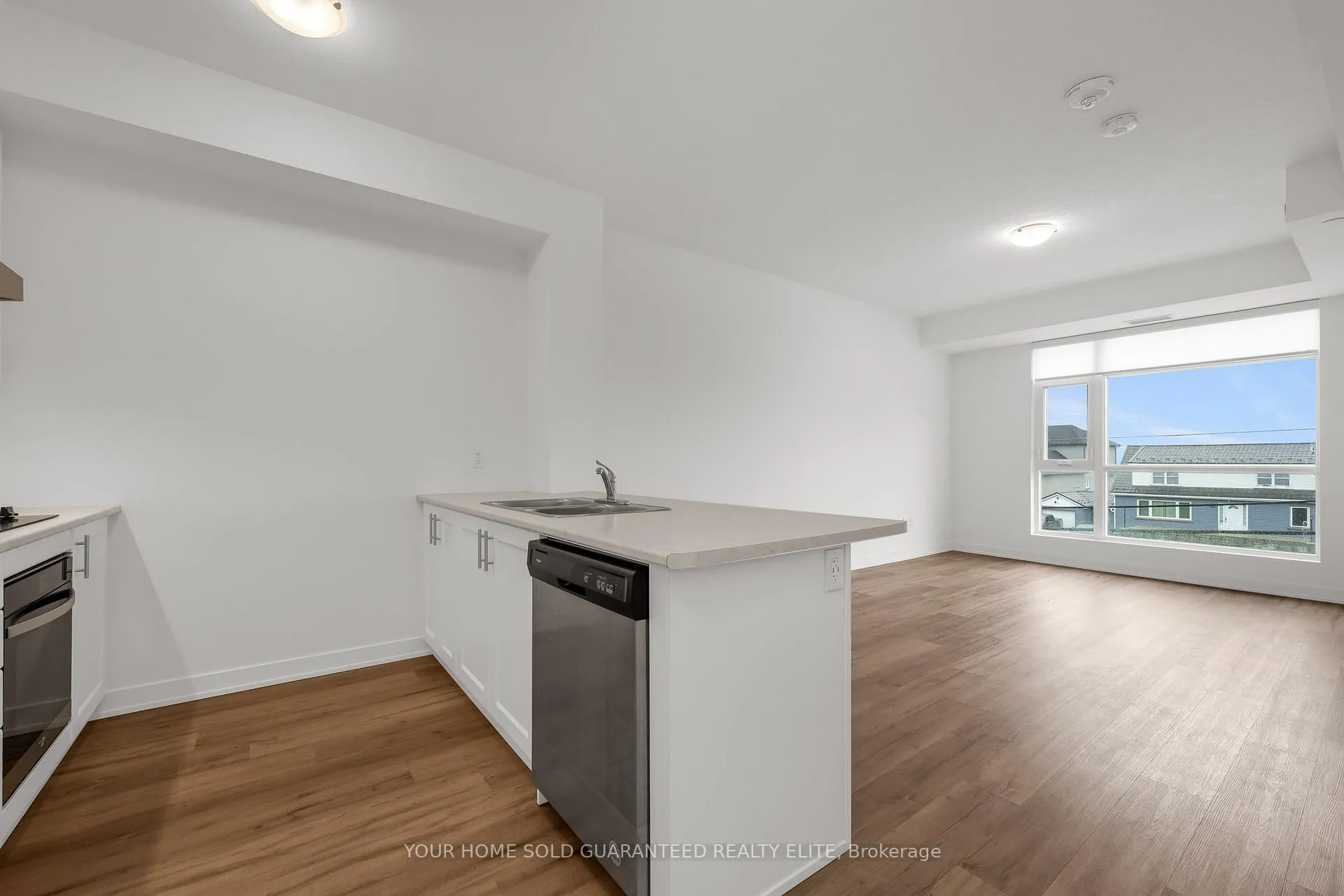 Photo 2 of Unit 211, 600 North Service Road, Hamilton, Lakeshore — HOMEH