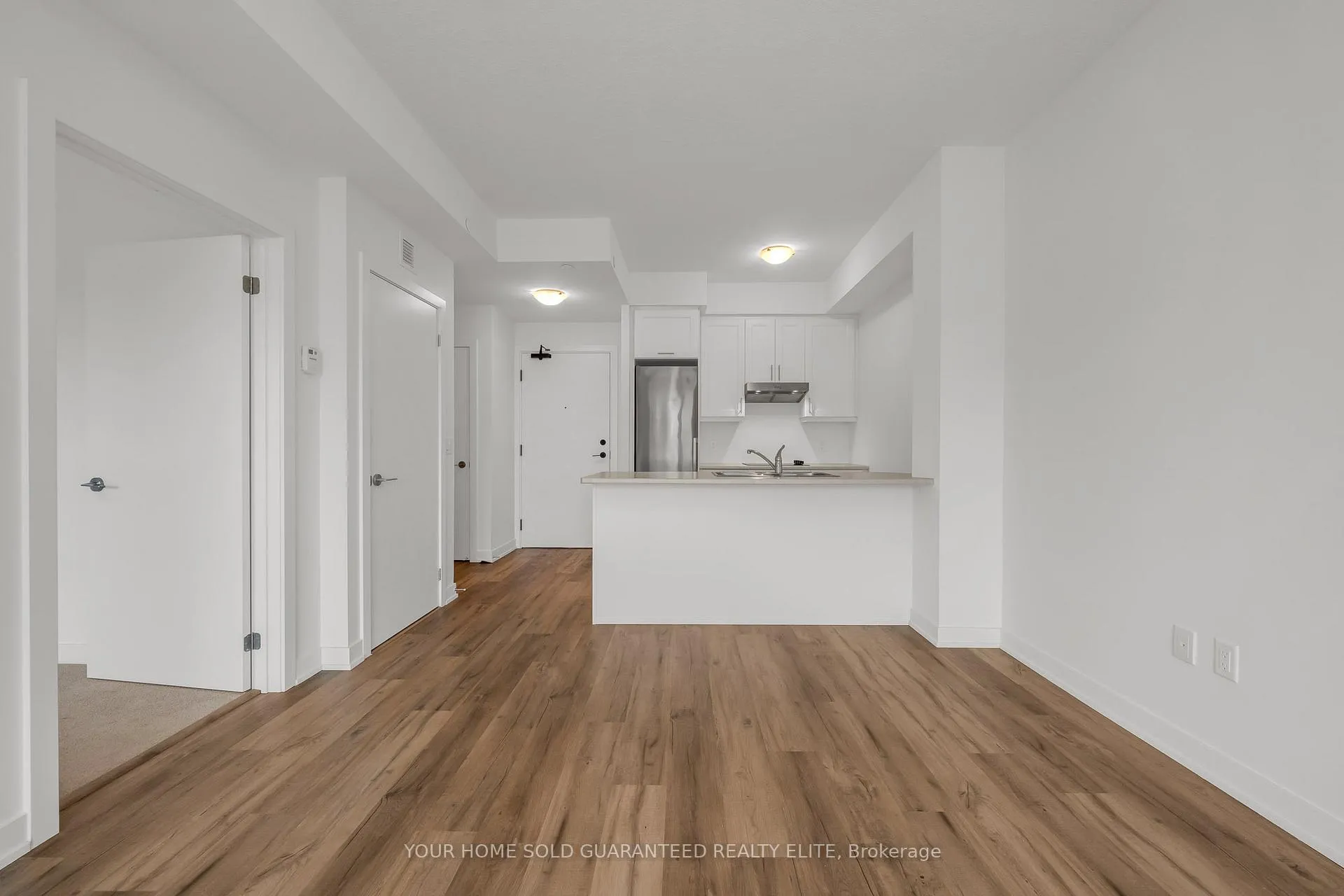 Photo 3 of Unit 211, 600 North Service Road, Hamilton, Lakeshore — HOMEH